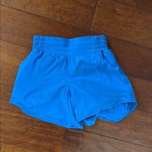 Blue Lululemon high rise running shorts